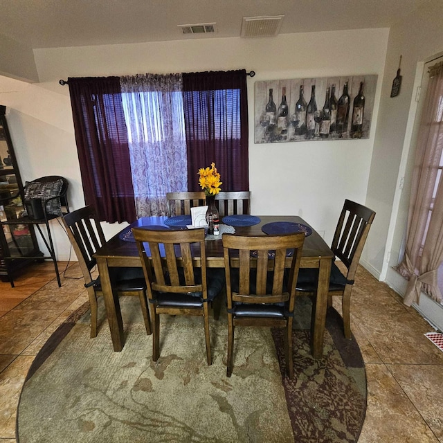 view of tiled dining space