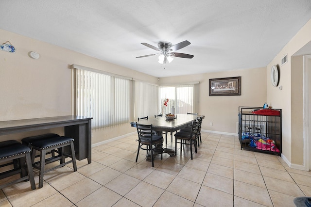 44627 E 11th St, Lancaster, CA 93535 - dining room with ceiling fan and light tile patterned floors