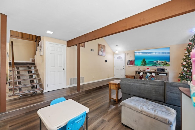 living room with vaulted ceiling with beams and dark hardwood / wood-style flooring