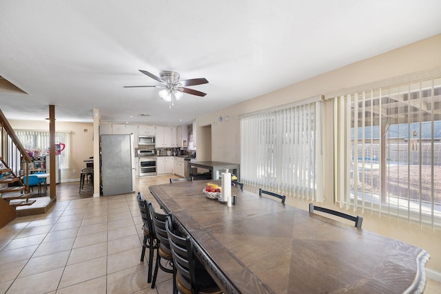 44627 E 11th St, Lancaster, CA 93535 - dining area featuring ceiling fan and light tile patterned floors