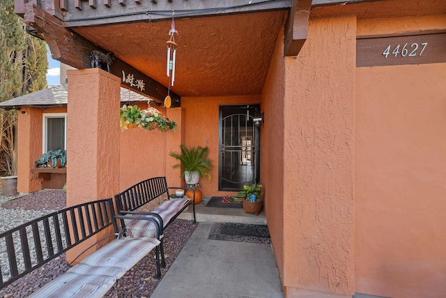 44627 E 11th St, Lancaster, CA 93535 - doorway to property with stucco siding