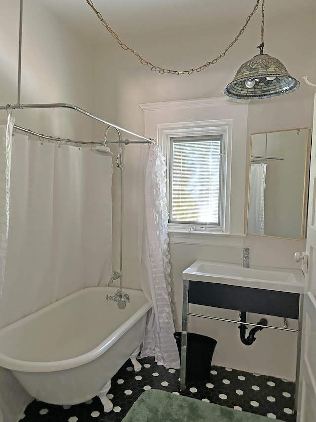 bathroom featuring sink and shower / bathtub combination with curtain