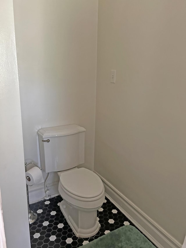 bathroom featuring toilet