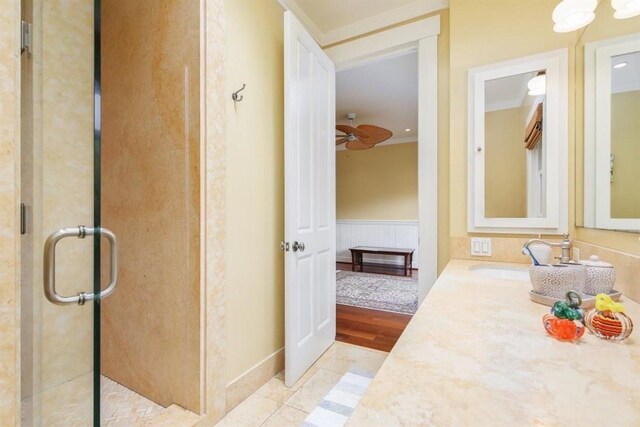 65-1104 Hokuula Rd, Kamuela, HI 96743 - bathroom with a shower stall, vanity, and wainscoting