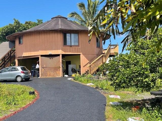 126 W Kinai Pl, Hilo, HI 96720 - view of front of property with stairway and asphalt driveway