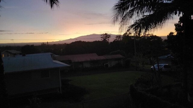 126 W Kinai Pl, Hilo, HI 96720 - yard at dusk featuring a mountain view