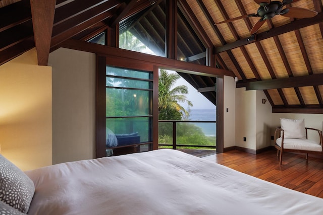 4221 Anini Vista Dr # A, Kilauea, HI 96754 - bedroom with hardwood / wood-style floors, multiple windows, a water view, and baseboards