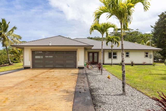 15-1757 4th Ave, Keaau, HI 96749 - single story home with french doors, a garage, metal roof, driveway, and a front yard
