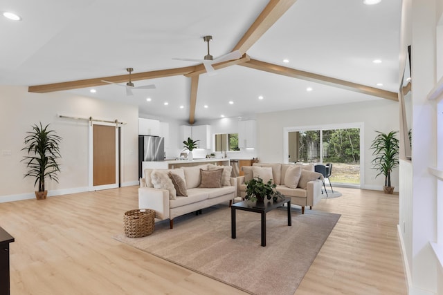 15-1757 4th Ave, Keaau, HI 96749 - living area with a barn door, light wood-style floors, baseboards, a ceiling fan, and recessed lighting