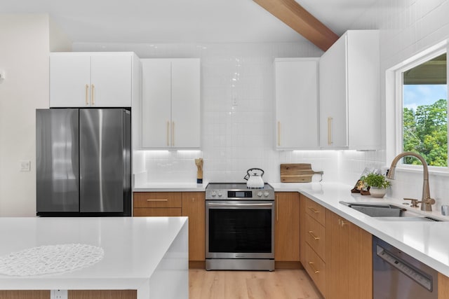 15-1757 4th Ave, Keaau, HI 96749 - kitchen with stainless steel appliances, a sink, light countertops, and backsplash