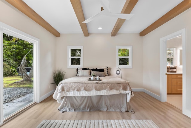 15-1757 4th Ave, Keaau, HI 96749 - bedroom with beam ceiling, light wood finished floors, baseboards, access to outside, and ensuite bath