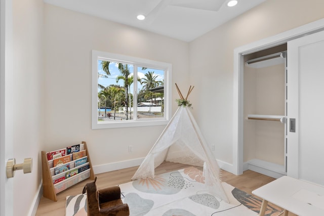15-1757 4th Ave, Keaau, HI 96749 - playroom with light wood finished floors, baseboards, and recessed lighting