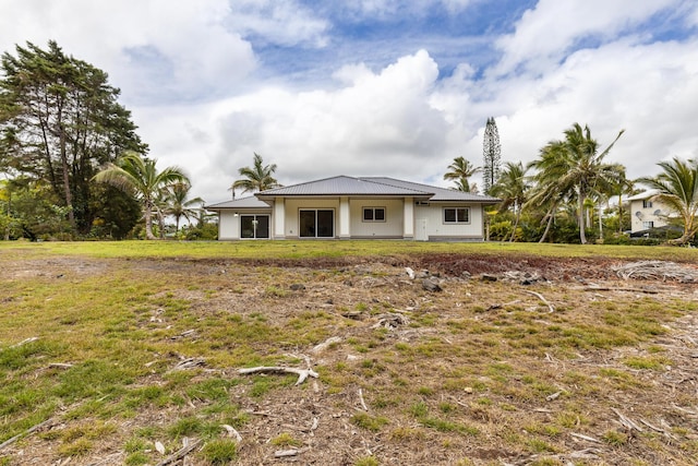 15-1757 4th Ave, Keaau, HI 96749 - view of front of property with a front lawn and metal roof