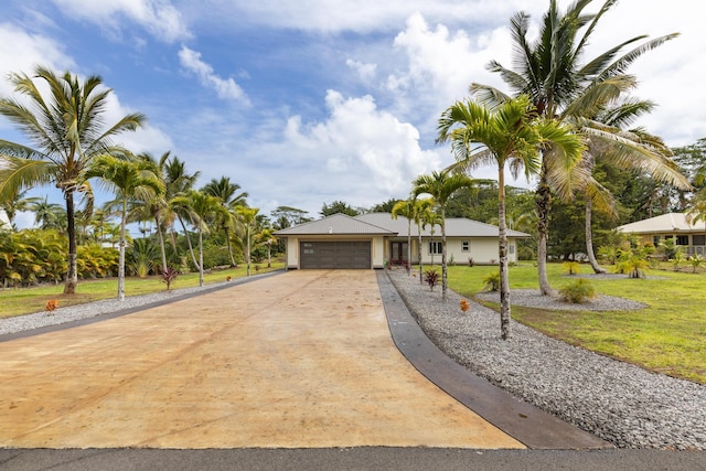 15-1757 4th Ave, Keaau, HI 96749 - view of front facade featuring concrete driveway, a garage, and a front yard