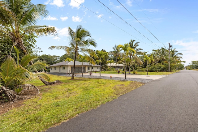 15-1757 4th Ave, Keaau, HI 96749 - view of front of home with driveway and a front yard