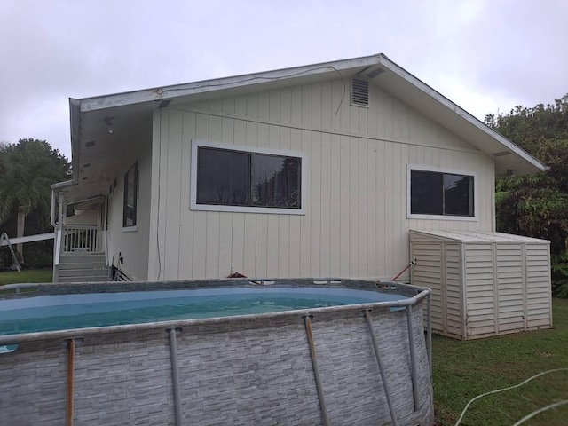 11-3193 Hibiscus St, Mountain View, HI 96771 - rear view of house with an outdoor pool