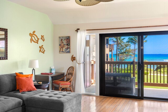 4460 Nehe Rd Unit 212, Lihue, HI 96766 - entrance foyer featuring hardwood / wood-style flooring, lofted ceiling, healthy amount of natural light, and ceiling fan