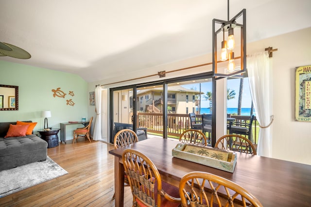 4460 Nehe Rd Unit 212, Lihue, HI 96766 - dining area with hardwood / wood-style floors and vaulted ceiling