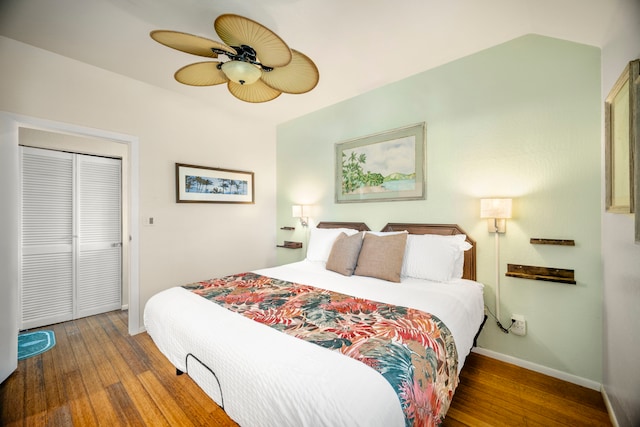 4460 Nehe Rd Unit 212, Lihue, HI 96766 - bedroom with wood finished floors, baseboards, ceiling fan, and a closet