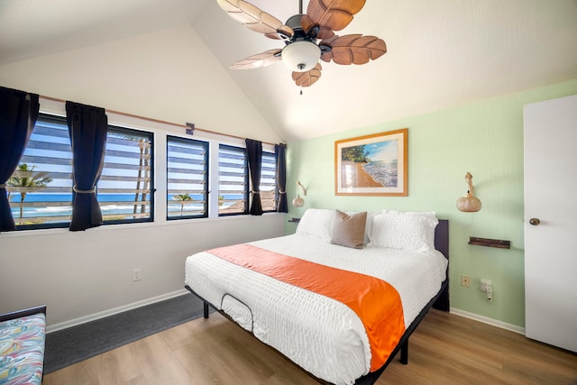 4460 Nehe Rd Unit 212, Lihue, HI 96766 - bedroom featuring lofted ceiling, baseboards, wood finished floors, and a ceiling fan