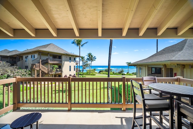 4460 Nehe Rd Unit 212, Lihue, HI 96766 - view of patio / terrace featuring a water view and outdoor dining space