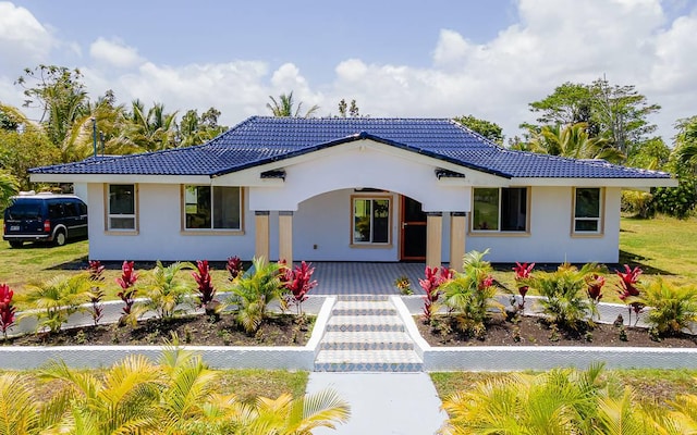 15-1660 3rd Ave, Keaau, HI 96749 - view of front of home with covered porch and a tile roof