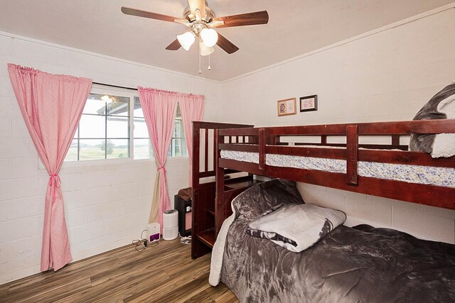 17-8160 N Kulani Rd, Mountain View, HI 96771 - bedroom with wood finished floors and concrete block wall