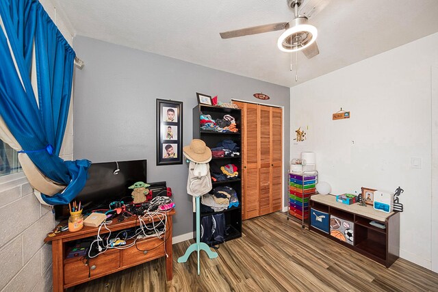 17-8160 N Kulani Rd, Mountain View, HI 96771 - home office with wood finished floors, a ceiling fan, and baseboards