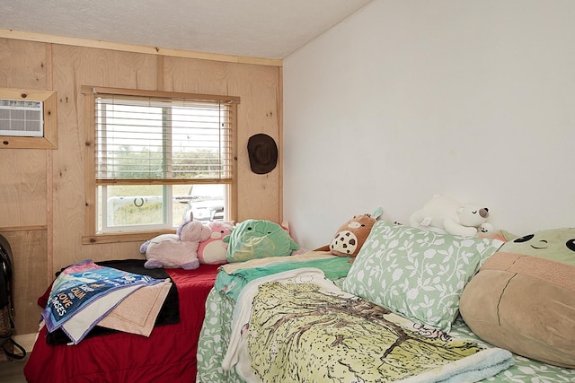 17-8160 N Kulani Rd, Mountain View, HI 96771 - bedroom featuring wooden walls and a wall unit AC