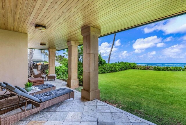 5070 Kukuna Rd, Anahola, HI 96746 - view of patio with a water view