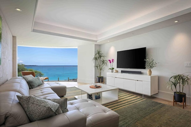 66-84 Kaunaoa Dr Unit C55, Kamuela, HI 96743 - living room with floor to ceiling windows, baseboards, wood finished floors, a tray ceiling, and recessed lighting