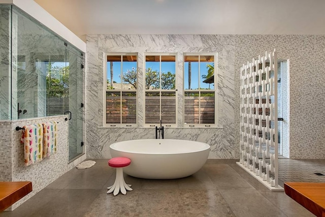 72-3023 Kakapa Pl, Kailua-Kona, HI 96740 - bathroom with a freestanding bath, a marble finish shower, tile walls, and tile patterned floors