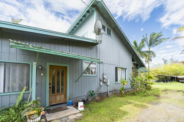 11-3171 Hibiscus St, Mountain View, HI 96771 - entrance to property featuring a lawn
