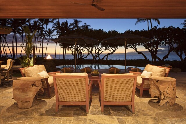 68-1015 Pauoa Way, Kamuela, HI 96743 - view of patio / terrace with a water view, a ceiling fan, and outdoor dining area