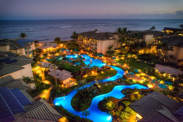 4-820 Kuhio Hwy Unit C402, Kapaa, HI 96746 - drone / aerial view of a pool area and a nearby body of water