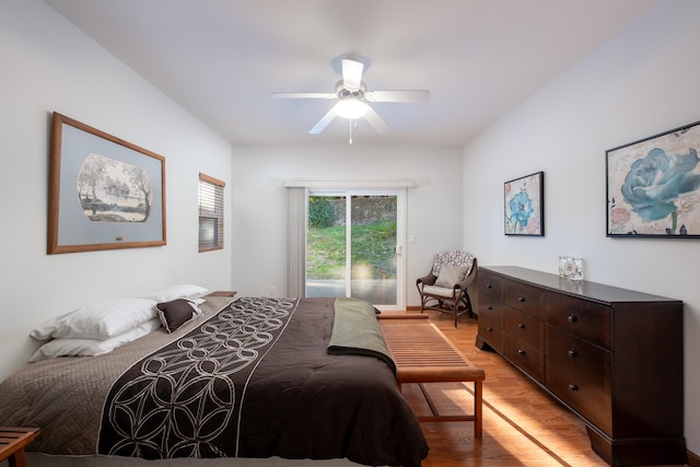 68-1693 Malie St, Waikoloa, HI 96738 - bedroom with light wood-type flooring, access to outside, and a ceiling fan