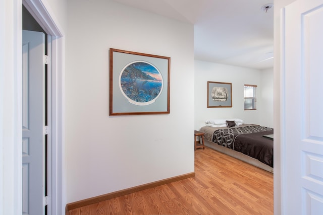 68-1693 Malie St, Waikoloa, HI 96738 - corridor with light wood-type flooring and baseboards