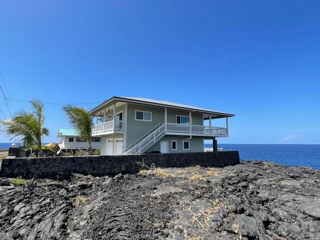 88-119 Kai Ave, Captain Cook, HI 96704 - view of front of home featuring a water view and stairs