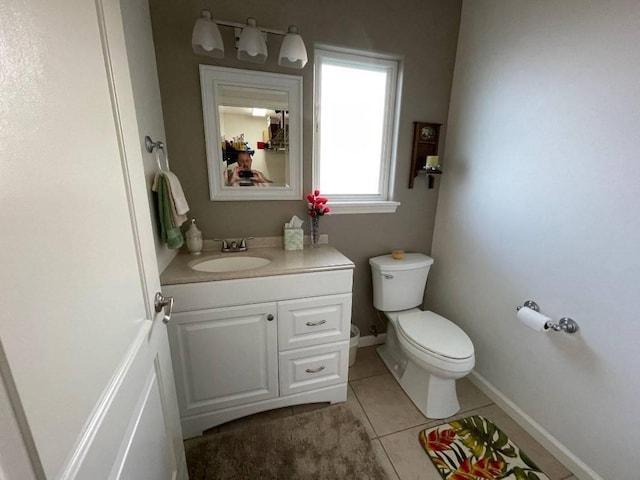88-119 Kai Ave, Captain Cook, HI 96704 - half bath featuring vanity, toilet, tile patterned flooring, and baseboards