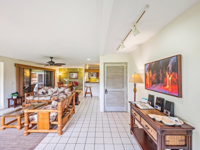 78-261 Manukai St Unit 201, Kailua-Kona, HI 96740 - living room with rail lighting, ceiling fan, and light tile patterned floors