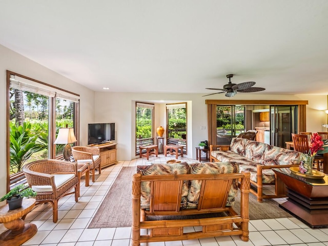 78-261 Manukai St Unit 201, Kailua-Kona, HI 96740 - living room with plenty of natural light, light tile patterned floors, and ceiling fan