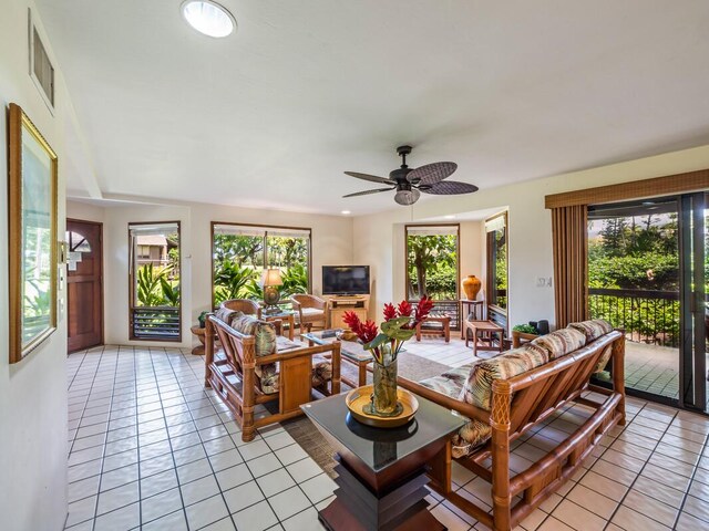 78-261 Manukai St Unit 201, Kailua-Kona, HI 96740 - living area with healthy amount of natural light, light tile patterned floors, and ceiling fan