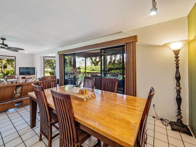 78-261 Manukai St Unit 201, Kailua-Kona, HI 96740 - dining room featuring light tile patterned floors and ceiling fan
