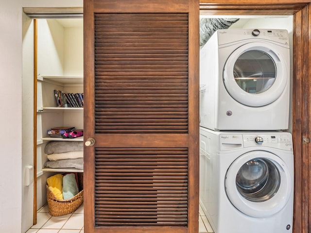 78-261 Manukai St Unit 201, Kailua-Kona, HI 96740 - laundry room featuring stacked washer and clothes dryer and tile patterned floors