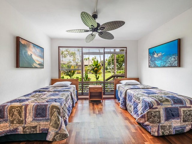 78-261 Manukai St Unit 201, Kailua-Kona, HI 96740 - bedroom with wood finished floors, access to outside, and a ceiling fan