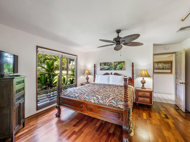 78-261 Manukai St Unit 201, Kailua-Kona, HI 96740 - bedroom featuring wood finished floors and a ceiling fan