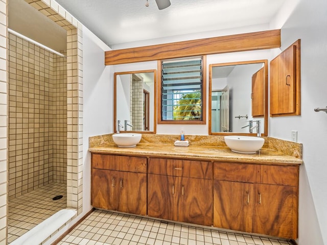 78-261 Manukai St Unit 201, Kailua-Kona, HI 96740 - full bath featuring a shower stall, double vanity, a ceiling fan, and tile patterned floors