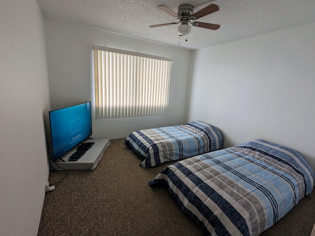 74-5618 Palani Rd Unit K4, Kailua-Kona, HI 96740 - bedroom featuring carpet, a textured ceiling, and a ceiling fan