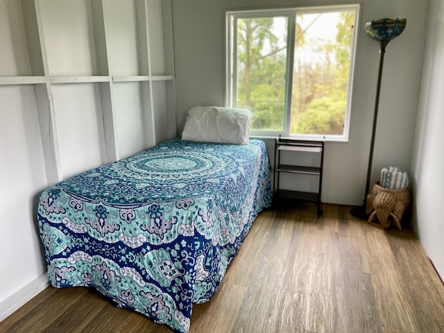 16-1824 Hopue Rd, Mountain View, HI 96760 - bedroom with wood finished floors and multiple windows