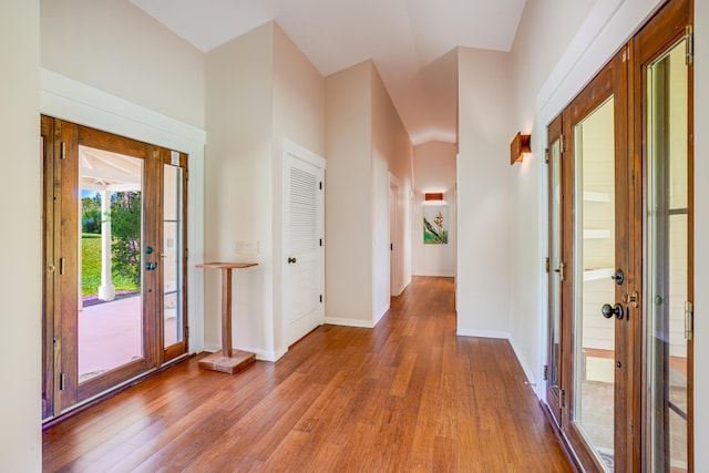 4875-J Kapaka St Unit 13D, Princeville, HI 96722 - foyer featuring wood finished floors and baseboards